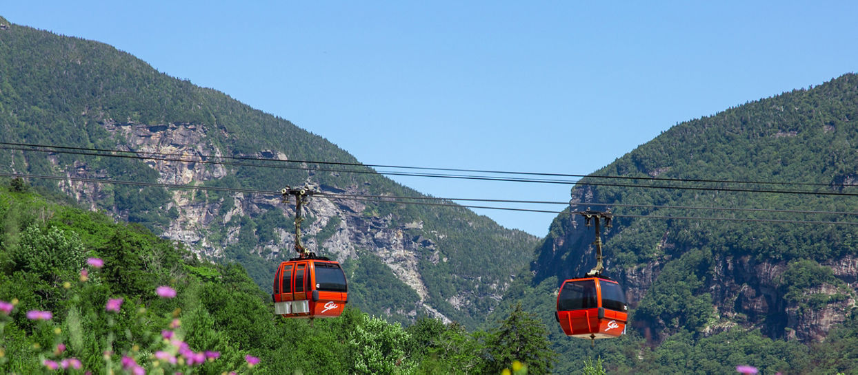 Gondola Skyride with smugglers notch backdrop