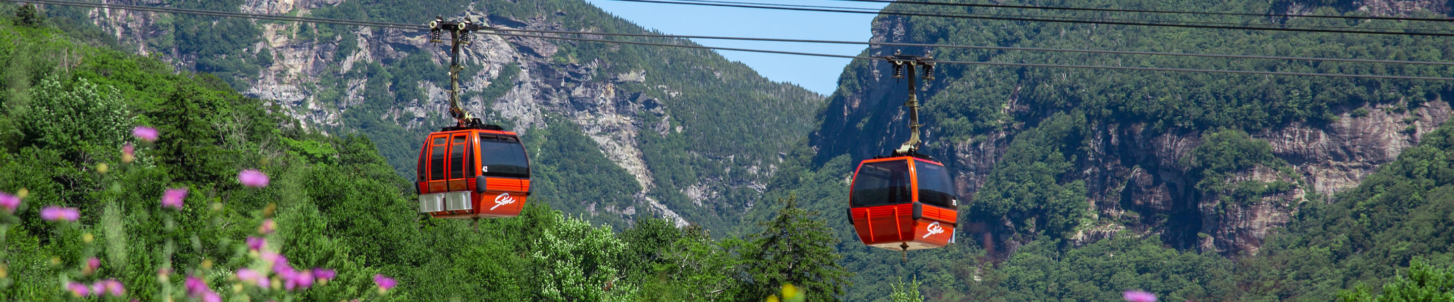 Gondola Skyride with smugglers notch backdrop