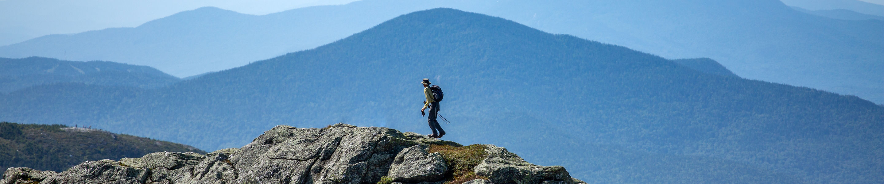 Hiker on Mount Mansfield ridge trail 3