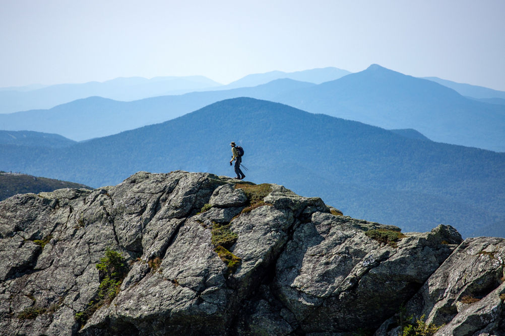 Hiker on Mount Mansfield ridge trail 3