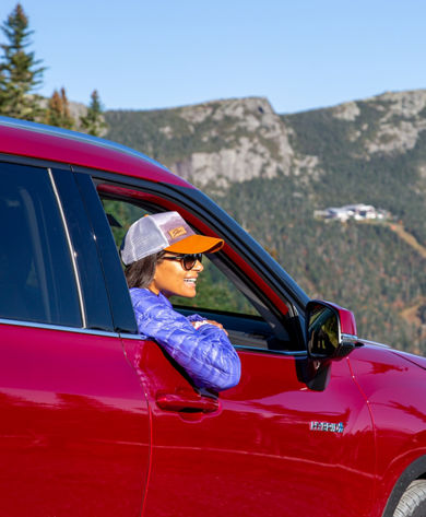 Model looking out Toyota window on Toll Road at Stowe