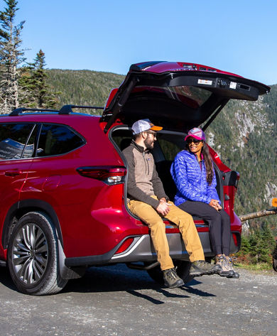 Models sitting on Toyota tailgate on Toll Road in Stowe