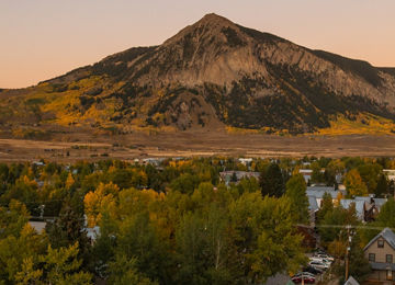 Mount Crested Butte above town during fall foliage