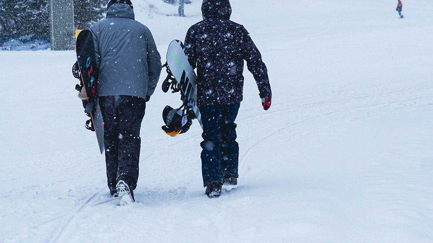 Snowboarders Walking to the Lift at Big Boulder