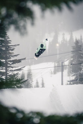 Joe Reed Snowboarding in the Terrain Park at Stevens Pass