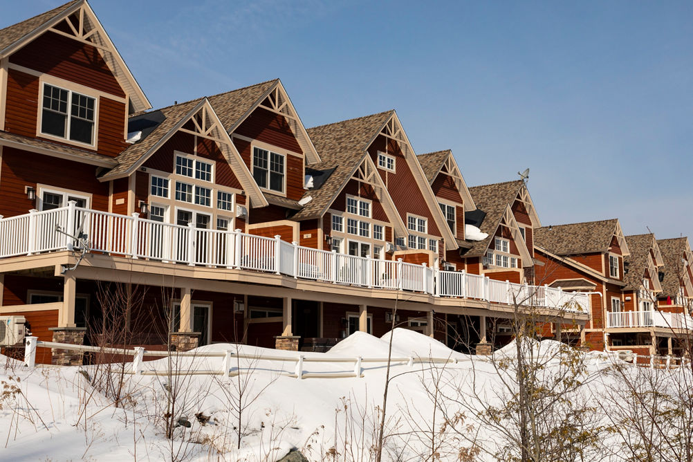 Exterior of Trails Edge Condominiums on a Sunny Day at Mount Snow 
