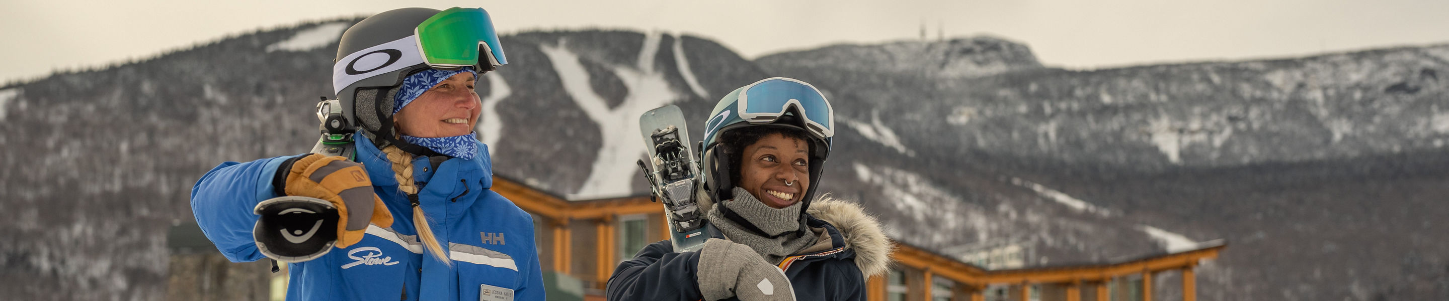 Resort Guests Walking with Skis with Ski Instructor
