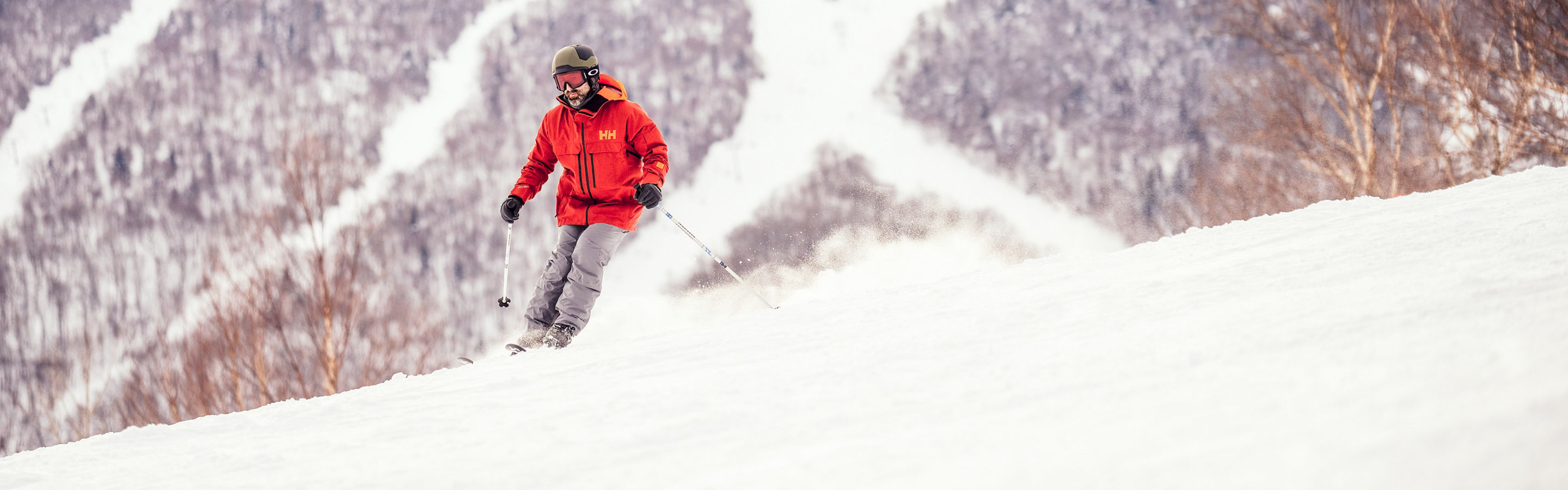 Skier Hits a Run at Stowe with a Scenic Background