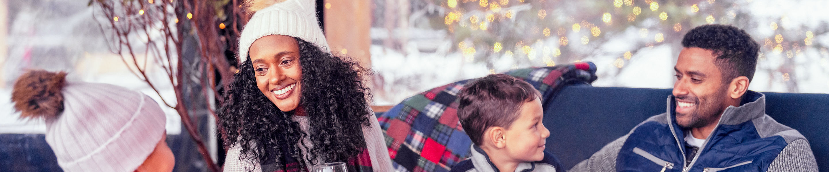 Family Enjoying Apres at Stowe Near a Fire