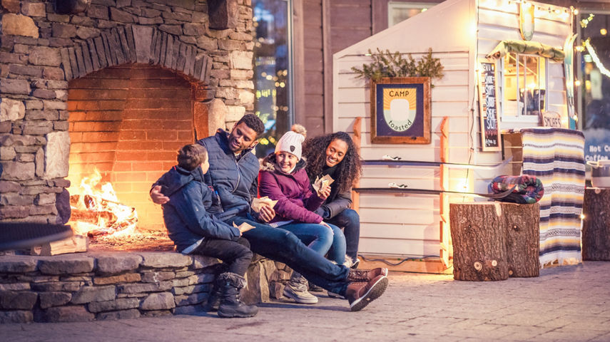 A Family Enjoys S'mores from Camp Toasted at Stowe