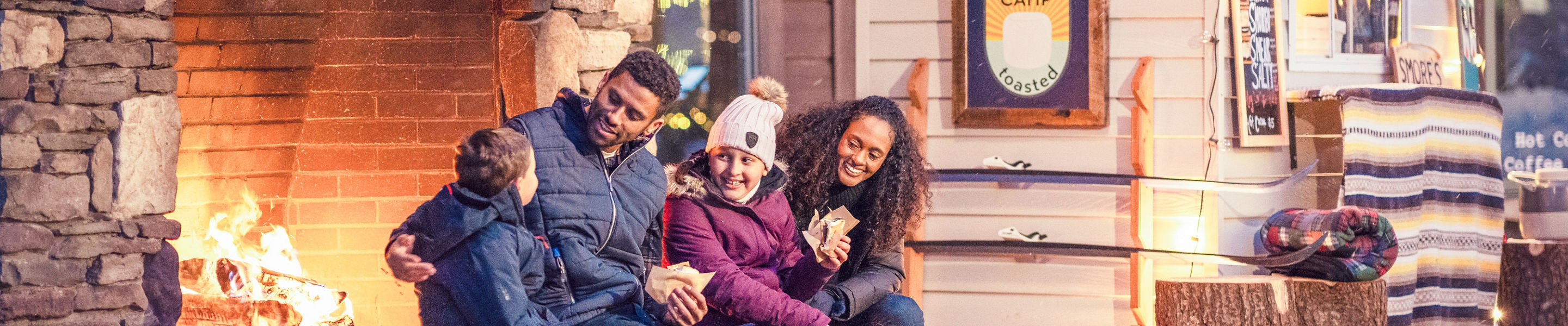 A Family Enjoys S'mores from Camp Toasted at Stowe