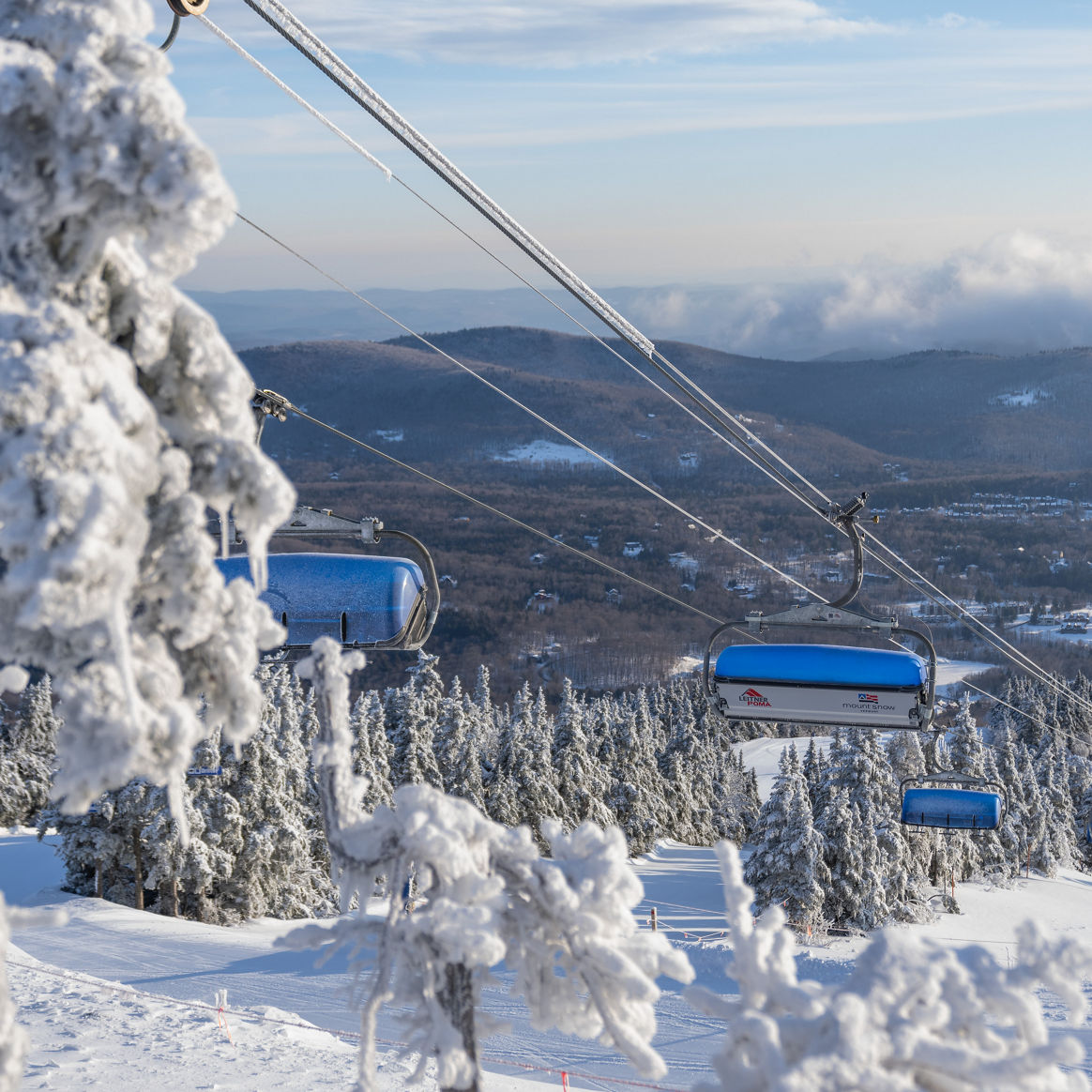 Bluebird Express at Mount Snow from the Summit Looking into the Valley with Snowy Trees