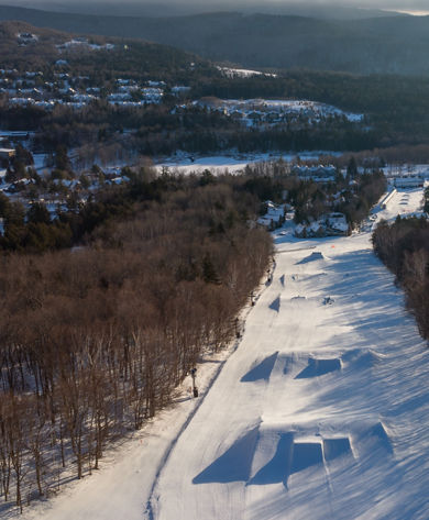 Aerial View of Terrain Park Features in The Gulch with Carinthia Base Lodge at Mount Snow