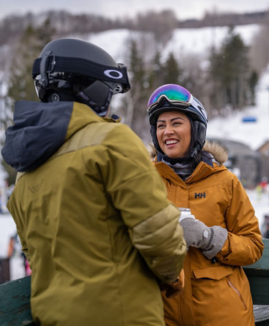 Couple Smiles on Station Tap Room Deck Overlooking Bluebird Barn at Mount Snow