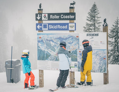 Group of Friends Skiing &amp; Snowboarding at Steven's Pass