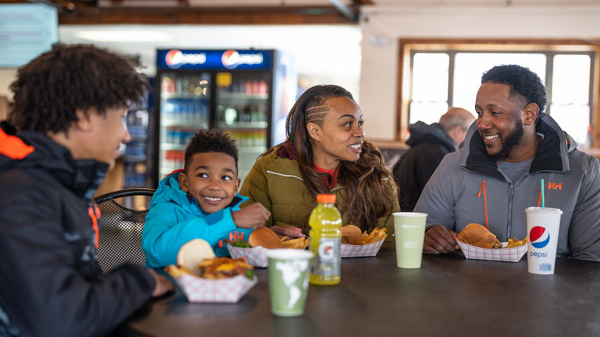 Family Enjoys Lunch at Sugar House after Skiing