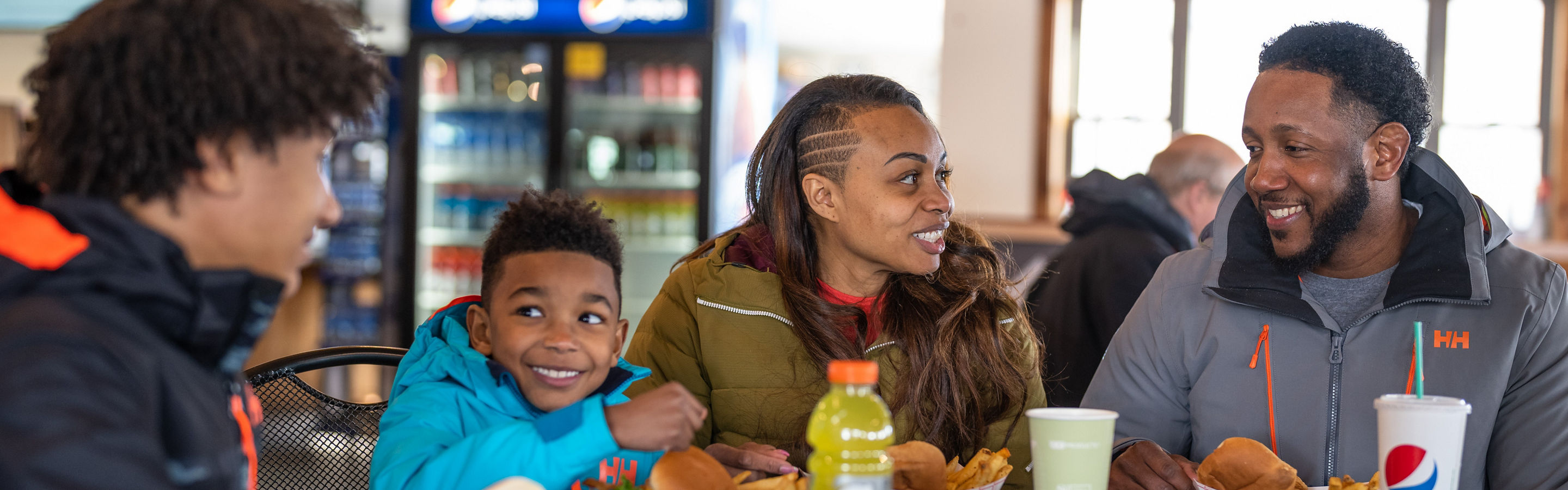 Family Enjoys Lunch at Sugar House after Skiing