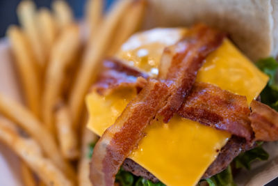 Close Up of Bacon Cheeseburger and Fries at Sugar House