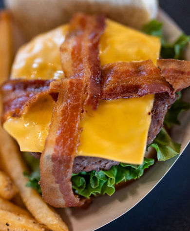 Close Up of Bacon Cheeseburger and Fries at Sugar House