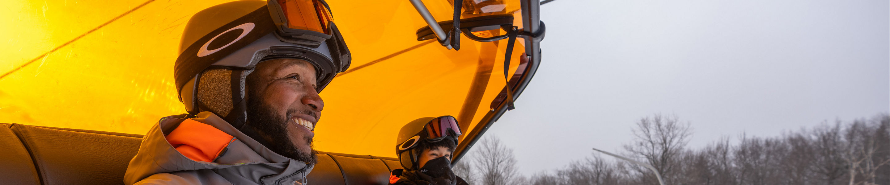 Family Rides Chairlift at Okemo