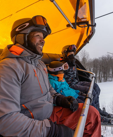 Family Rides Chairlift at Okemo