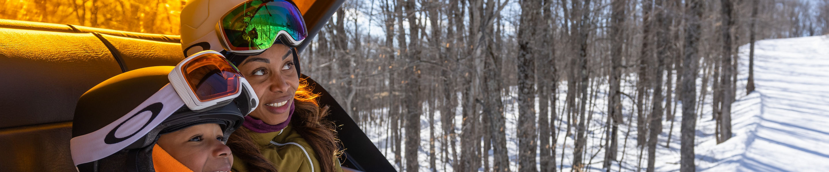 Mother and Son Riding Chairlift at Okemo