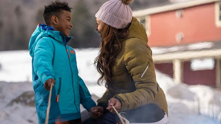 Mother and Son Roasting Marshmallows at Okemo