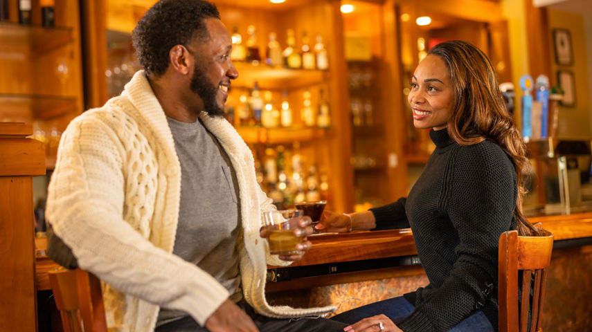 Couple Enjoys Drinks at Lobby Bar at Jackson Gore Inn at Okemo