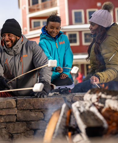 Family Roasting Marshmallows at Okemo