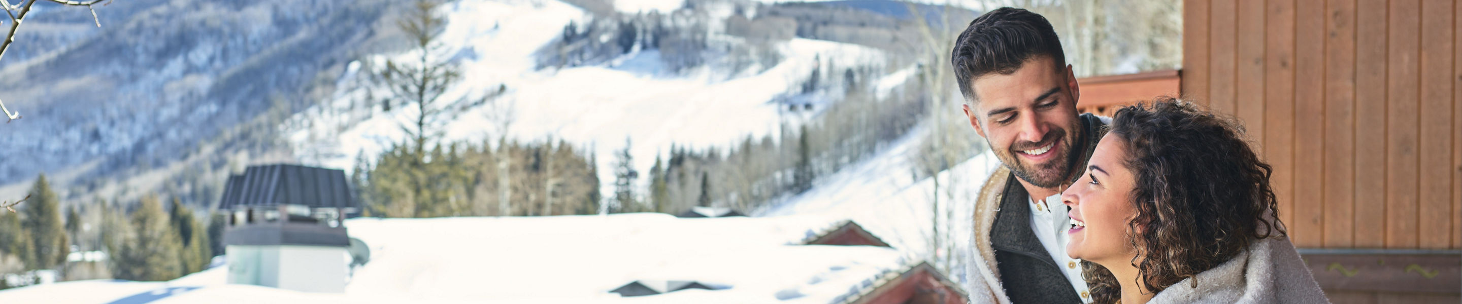 Couple on balcony at The Lodge at Vail