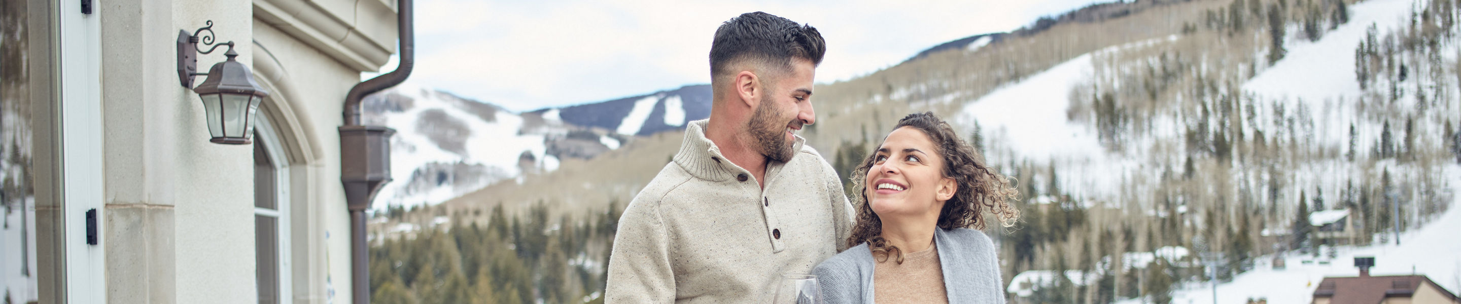 Couple on balcony at The Arrabelle