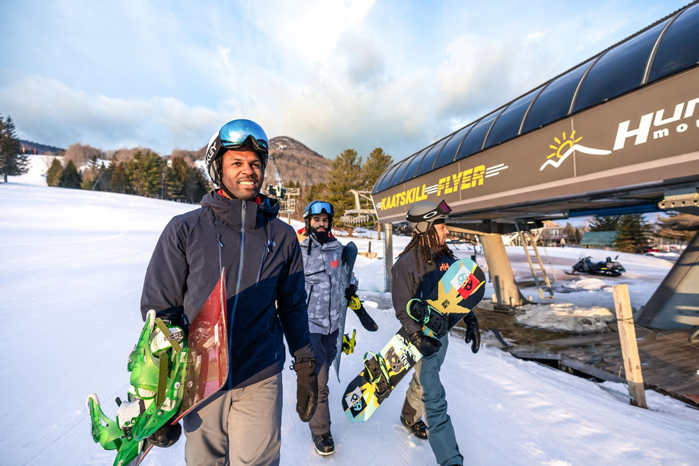 Resort Guests Walking to Lift at Hunter