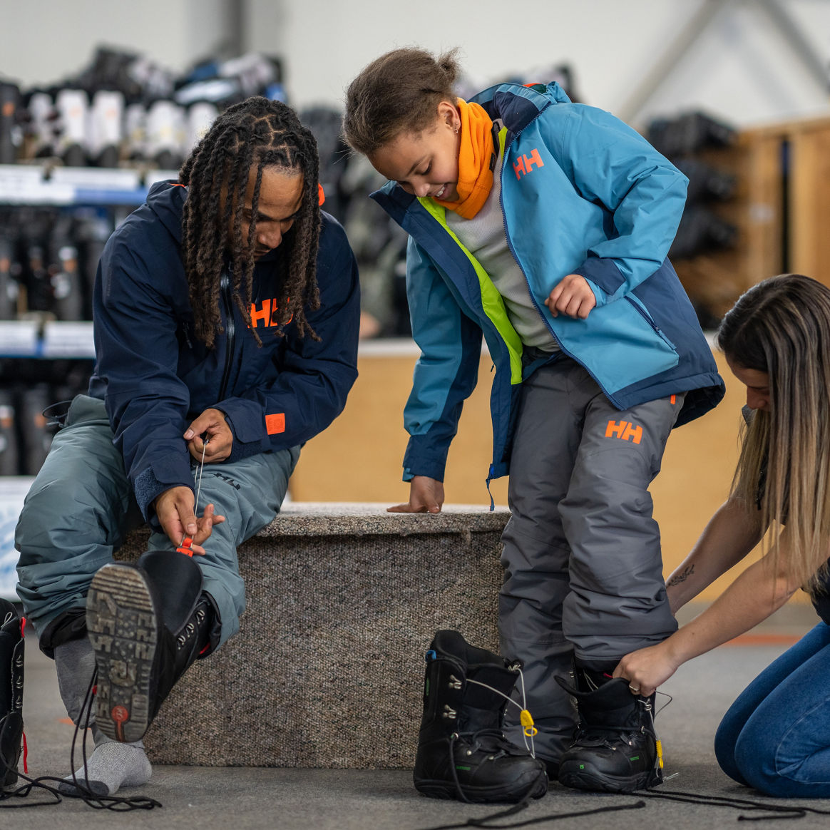 Resort Guests Getting Fitted for Snowboard Boots at Hunter