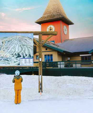 Skier Looks at Map at Mount Snow