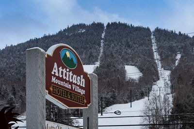Scenic View of Attitash Mountain Village Signage