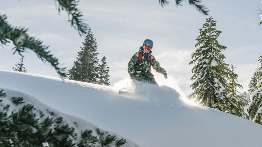 Snowboarder Riding Advanced Terrain at Stevens Pass
