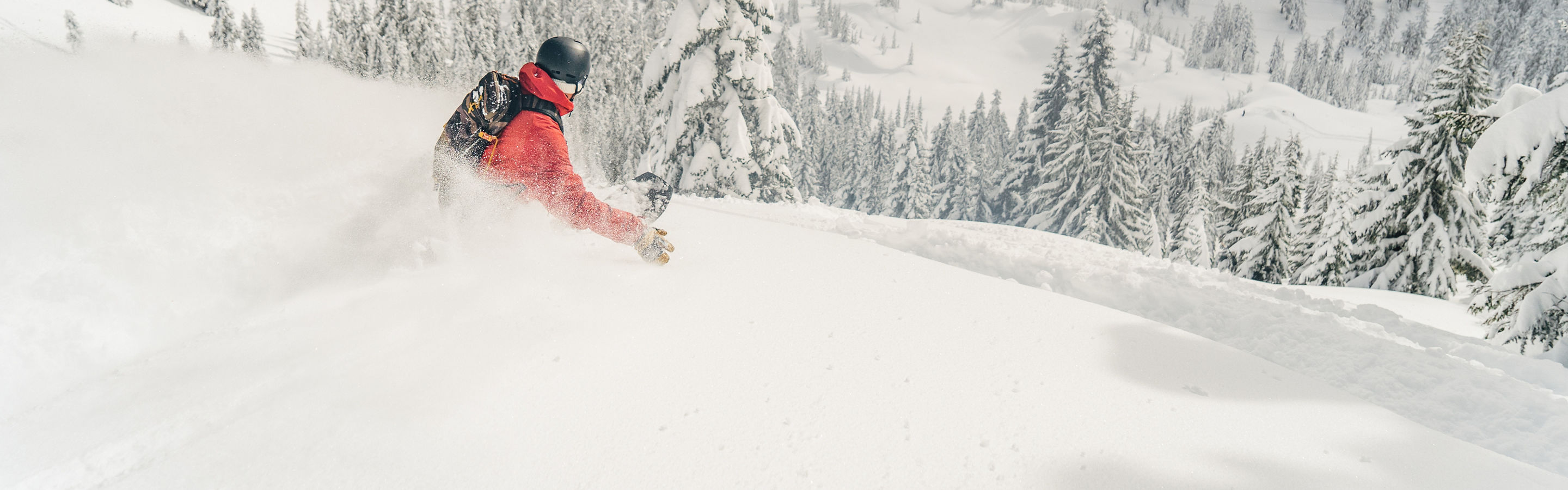 Snowboarder Riding Advanced Terrain at Stevens Pass