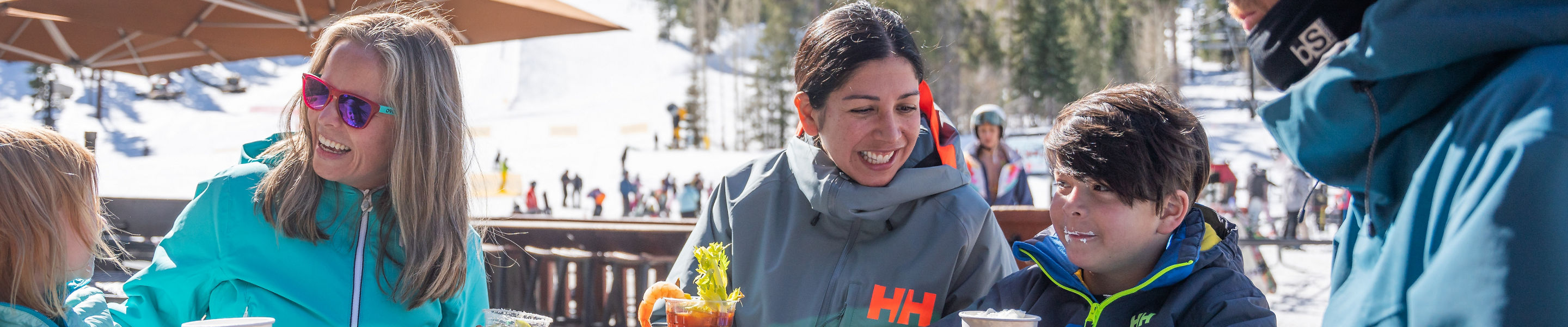 Family snowboarding with an instructor in a private lesson