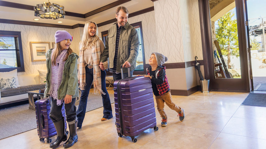 Family walks through lobby at Constellation Residences Northstar