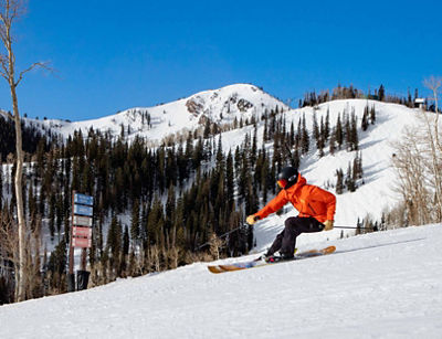Skier in Orange Jacket at Park City