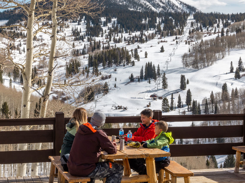 Family Enjoying a Quick Snack at Beaver Creek