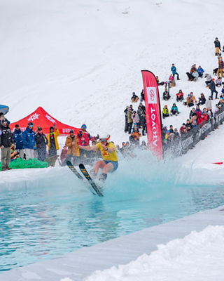 Keystone Slush Cup 2022 Skiier over Pond