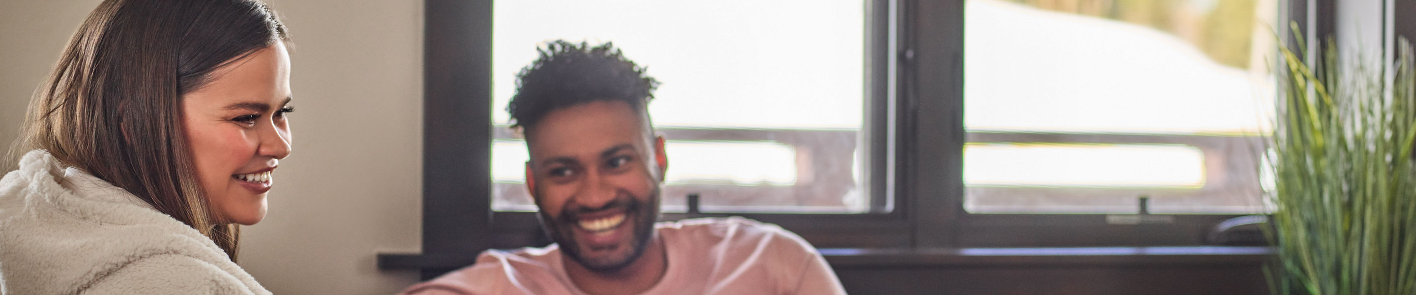 Couple Relaxes in Room at  One Ski Hill in Breckenridge