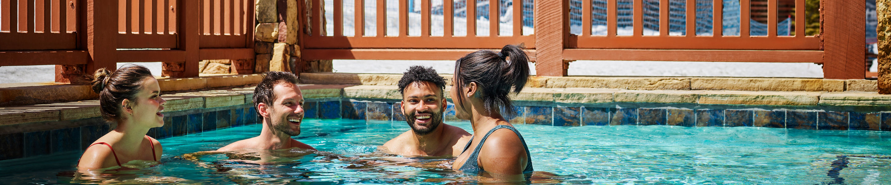 Friends Relaxing in Hot Tub at One Ski Hill in Breckenridge Resort