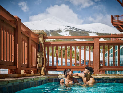 Couple Relaxing in Hot Tub at One Ski Hill in Breckenridge Resort