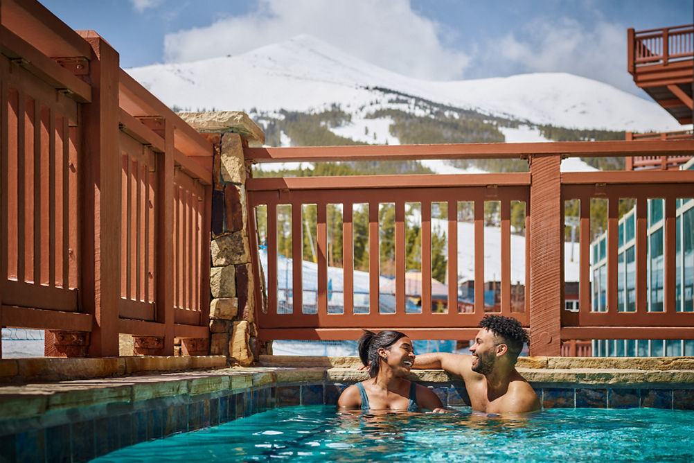 Couple Relaxing in Hot Tub at One Ski Hill in Breckenridge Resort