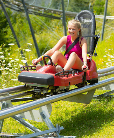 Girl on Timber Ripper Mountain Coaster at Okemo Adventure Zone in the Summer 