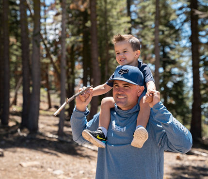 Father and son hike at Northstar