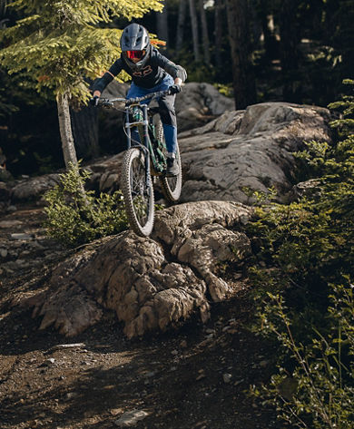 Mountain Biker on rock roll in Whistler Mountain Bike Park