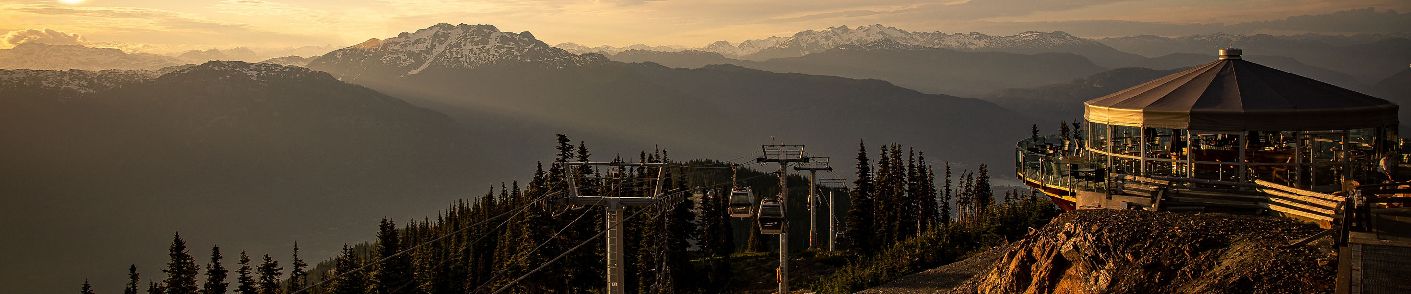 The Umbrella bar and Whistler Village Gondola at sunset